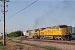 The Primer Unnumbered C44ACM Leads UP 5700 Northbound on The Wabtec Test Track at The Petty Place Crossing As They Begin A Night of Test Runs north and south on the Test Track.